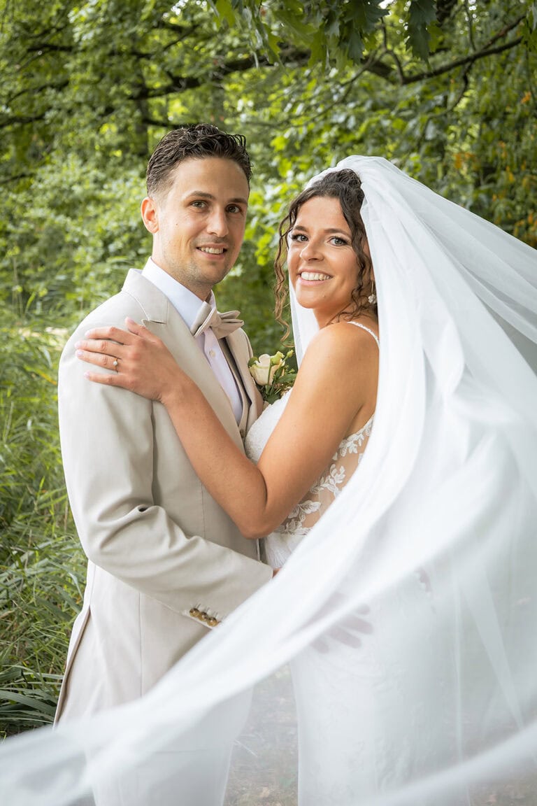 traditionele sluierfoto Bruiloft De Helden Van Kien